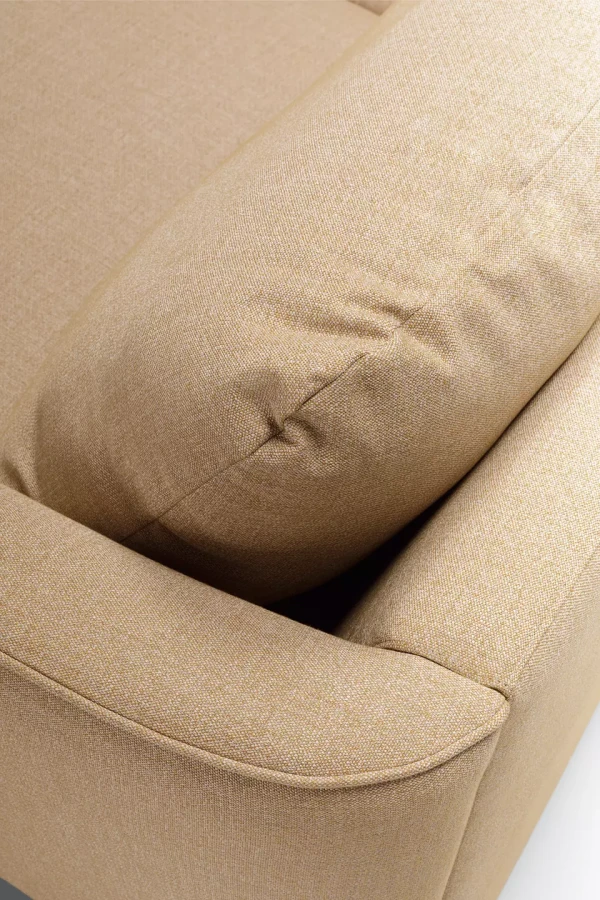 POLLY_3seater_molinia_1_yellow_6_domatoria_katowice_sofa_sits_polly.webp