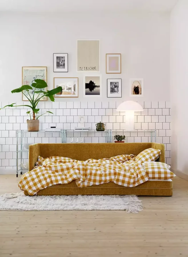 STINA_interior_3seater_sofa_bed_bloom_3_warm_yellow_3_domatoria_katowice_sofa_sits_stina.webp